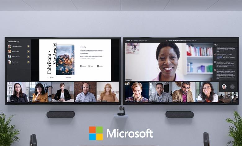 A Microsoft hybrid team meeting displayed on a dual-screen room system.