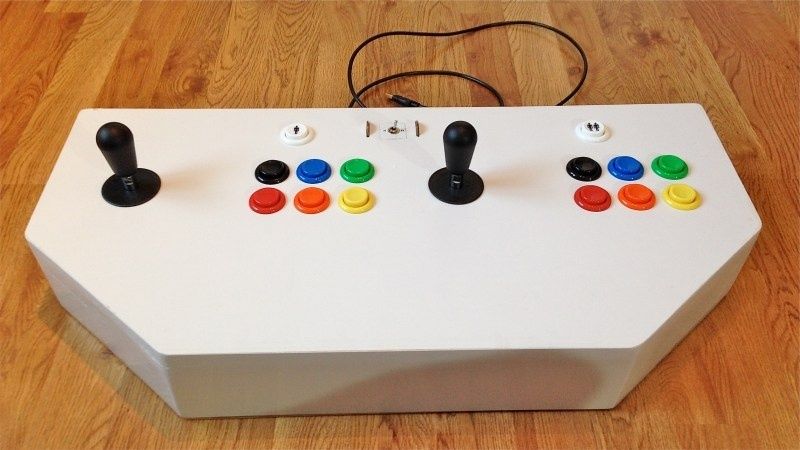 Custom arcade control panel with two joysticks and colorful buttons